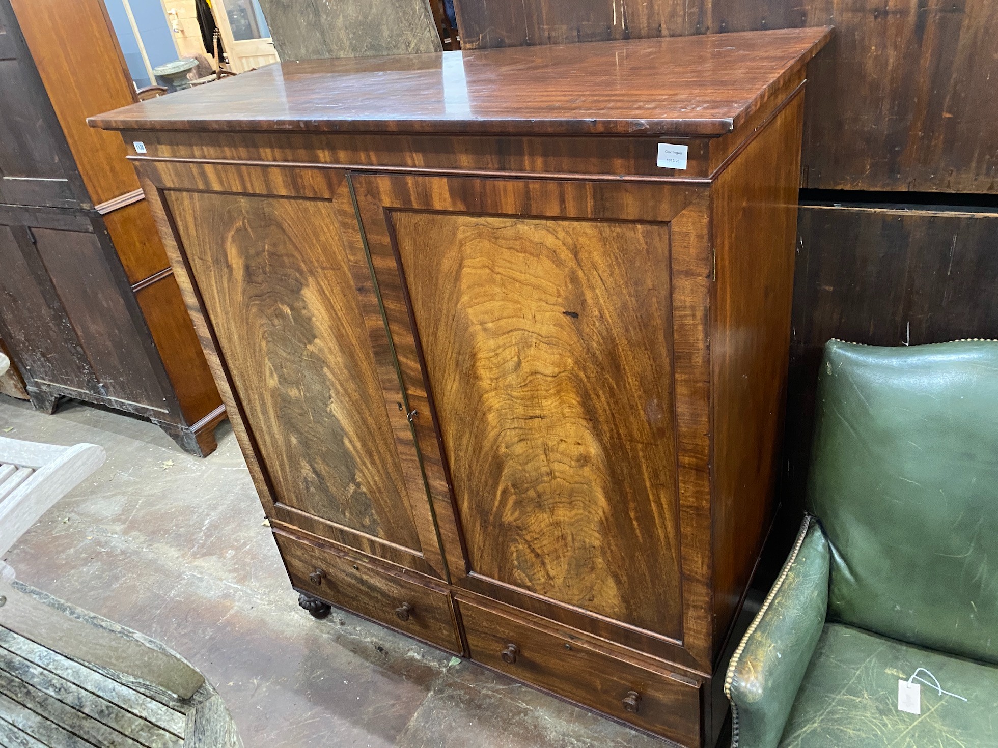 A George III mahogany linen press, width 135cm, depth 60cm, height 152cm